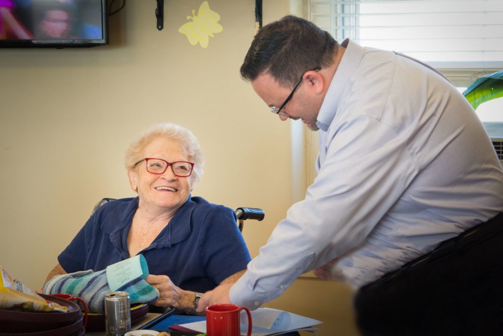 Woman speaking with man about stigmas around memory loss