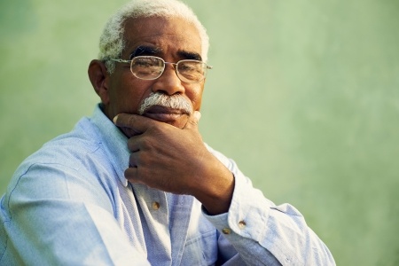 a contemplative senior Black man