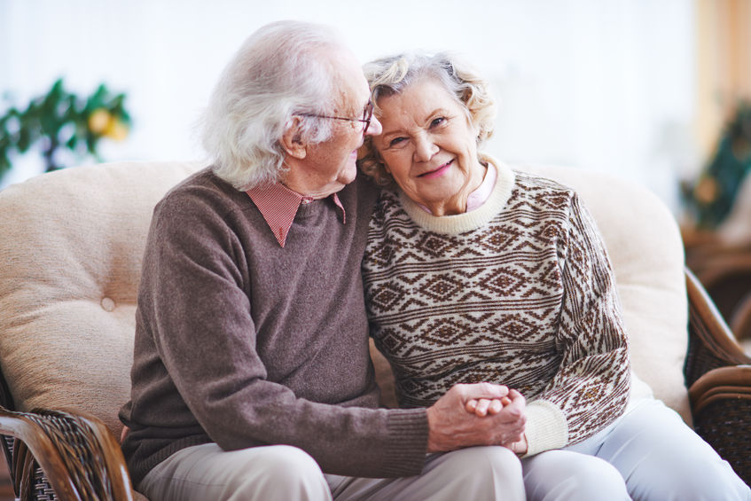 happy senior man and woman having rest at home