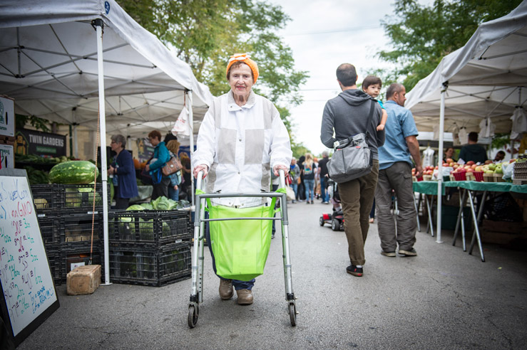 Senior Walking around the Andersonville Farmer's Market