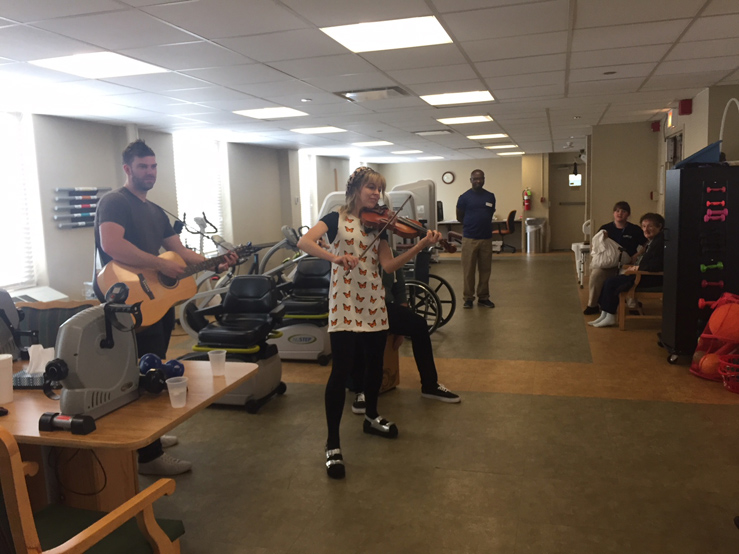 Lindsay Stirling playing violin for Seniors at Wesley Place in Chicago