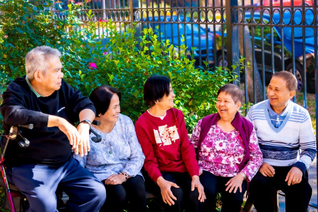 Image of a group of Asian American seniors at Glenwood Apartments.