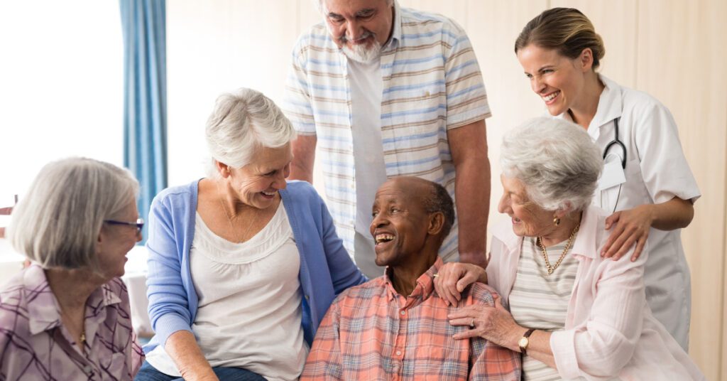 Image of a diverse group of senior adults laughing together.
